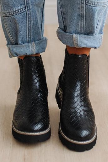 Black classic Chelsea silhouette with a woven, intrecciato-inspired finish and bold lug sole, crafted from atelier-selected materials. Grounded by our signature DreamCloud cushioned sole