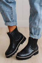 Black classic Chelsea silhouette with a woven, intrecciato-inspired finish and bold lug sole, crafted from atelier-selected materials. Grounded by our signature DreamCloud cushioned sole