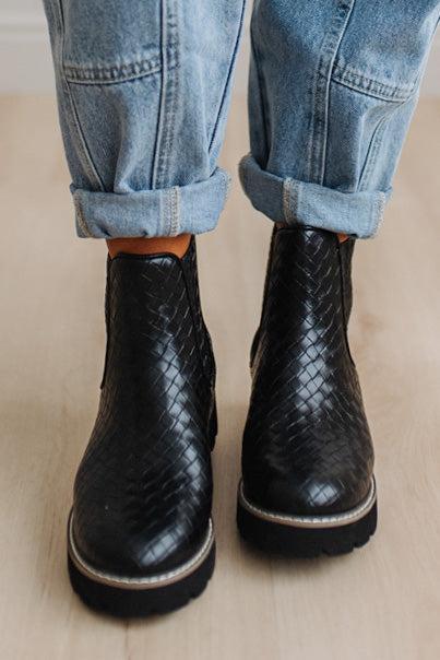 Black classic Chelsea silhouette with a woven, intrecciato-inspired finish and bold lug sole, crafted from atelier-selected materials. Grounded by our signature DreamCloud cushioned sole