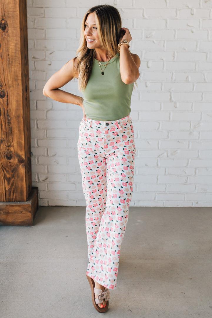 Blonde Woman Wearing Stretch Floral Print Straight Leg Denim Jeans.