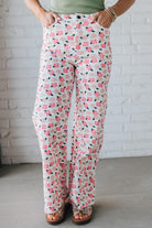 Blonde Woman Wearing Stretch Floral Print Straight Leg Denim Jeans.