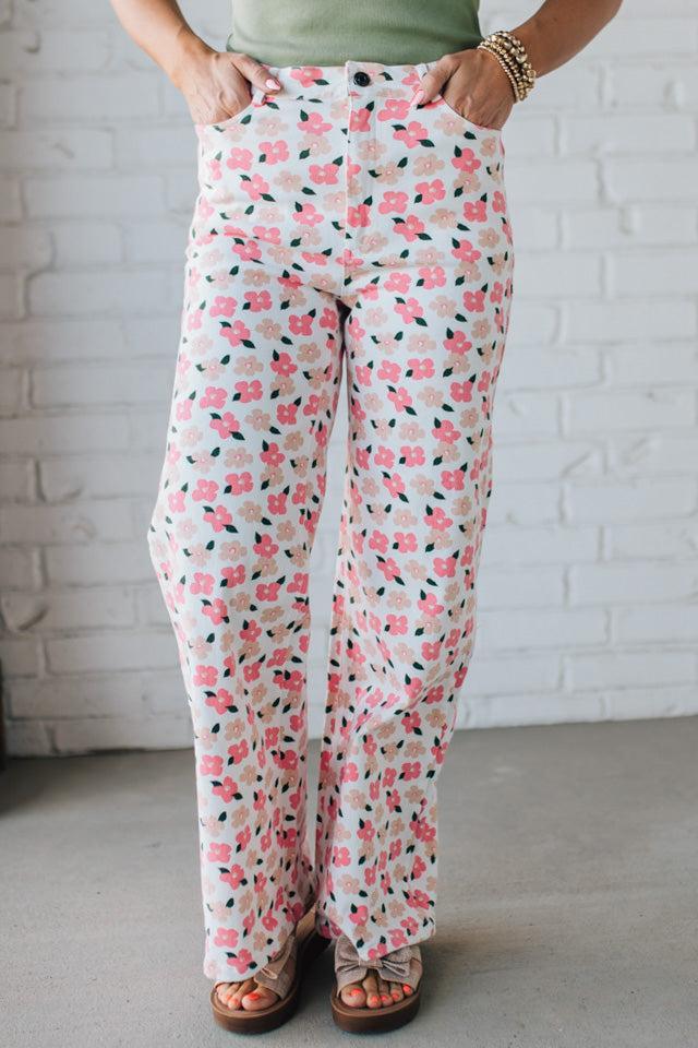 Blonde Woman Wearing Stretch Floral Print Straight Leg Denim Jeans.