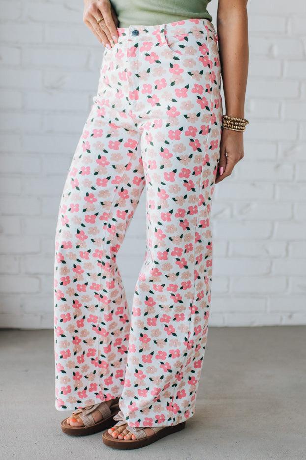 Blonde Woman Wearing Stretch Floral Print Straight Leg Denim Jeans.