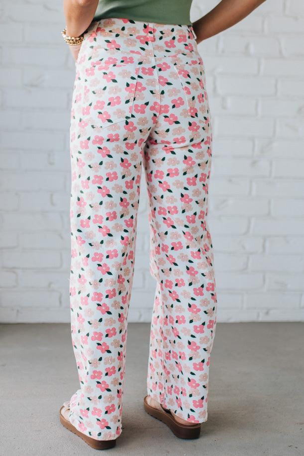 Blonde Woman Wearing Stretch Floral Print Straight Leg Denim Jeans.