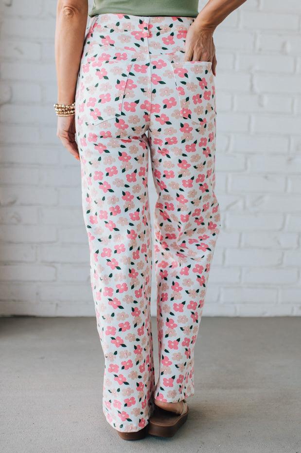 Blonde Woman Wearing Stretch Floral Print Straight Leg Denim Jeans.