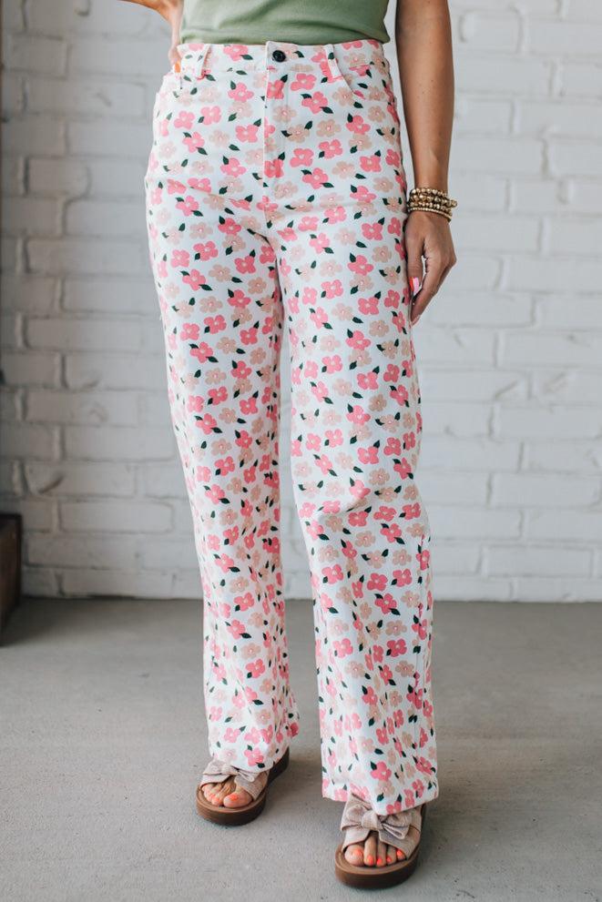 Blonde Woman Wearing Stretch Floral Print Straight Leg Denim Jeans.