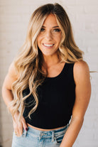 Blonde girl modeling a solid ribbed cropped tank