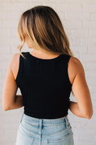 Blonde girl modeling a solid ribbed cropped tank