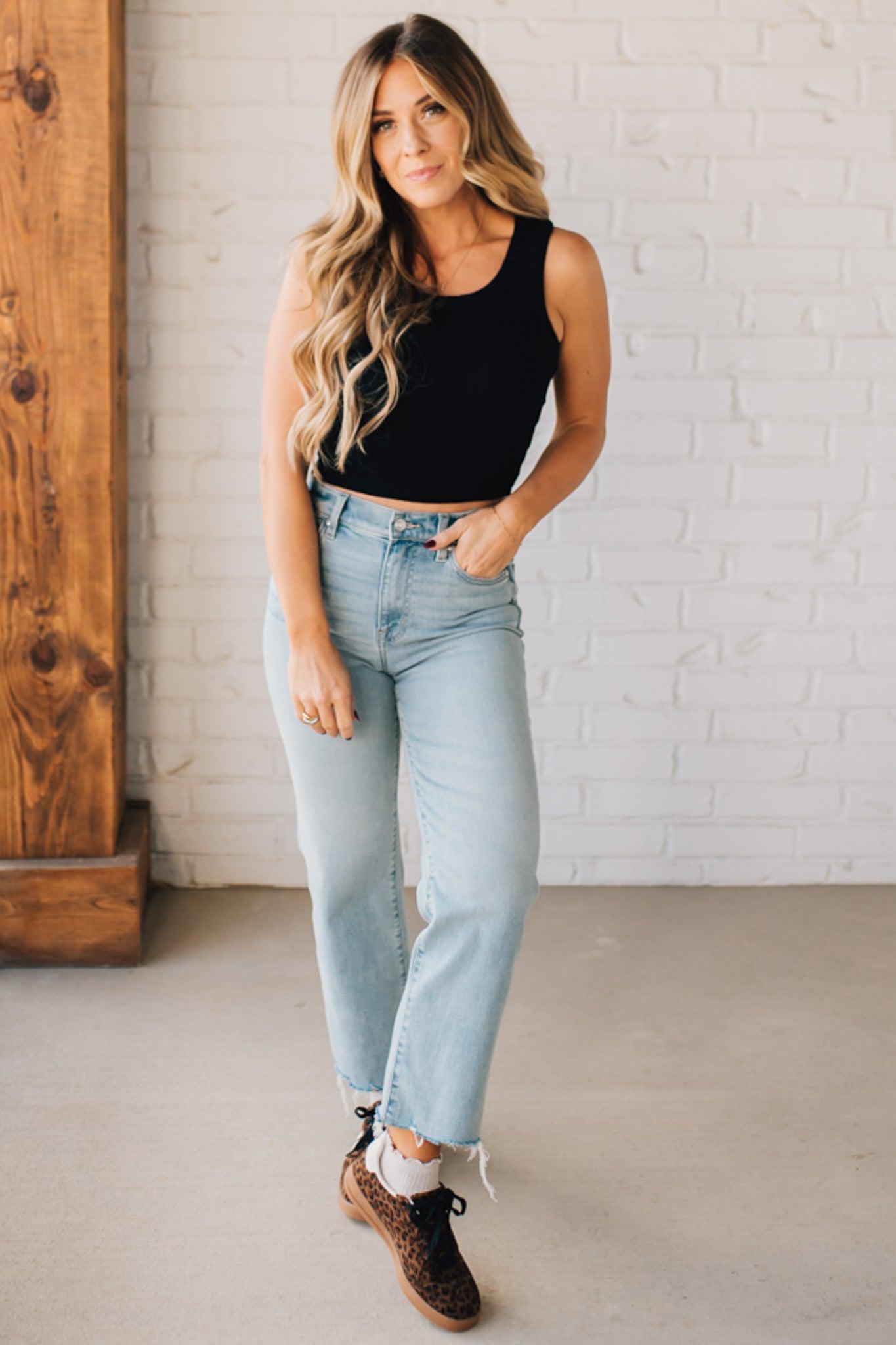 Blonde girl modeling a solid ribbed cropped tank