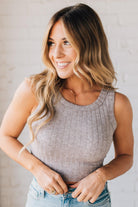 Blonde girl modeling a solid ribbed cropped tank