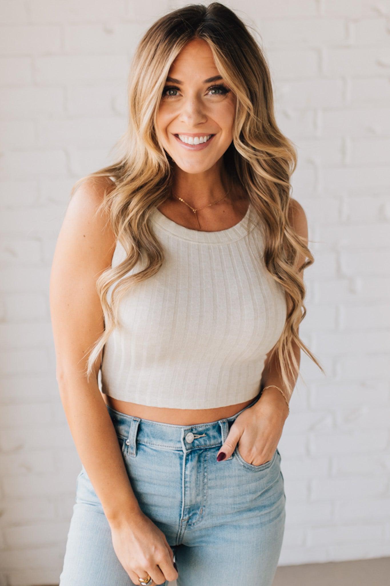 Blonde girl modeling a solid ribbed cropped tank