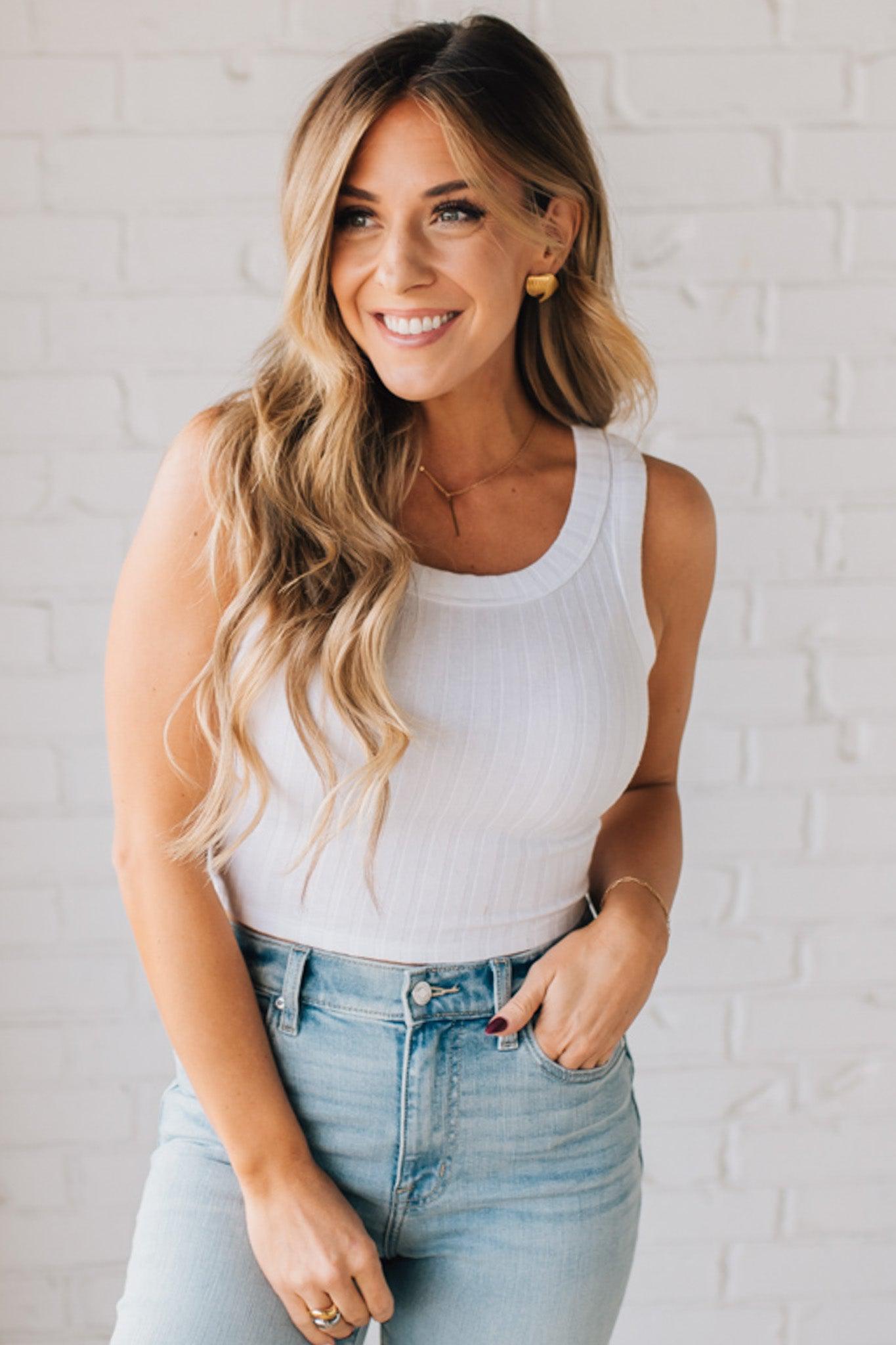 Blonde girl modeling a solid ribbed cropped tank