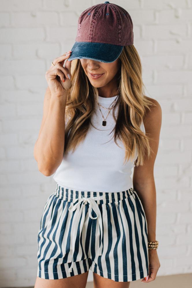 Blonde Woman Wearing Stripe Twill Shorts with Elastic Waist and Drawstring.