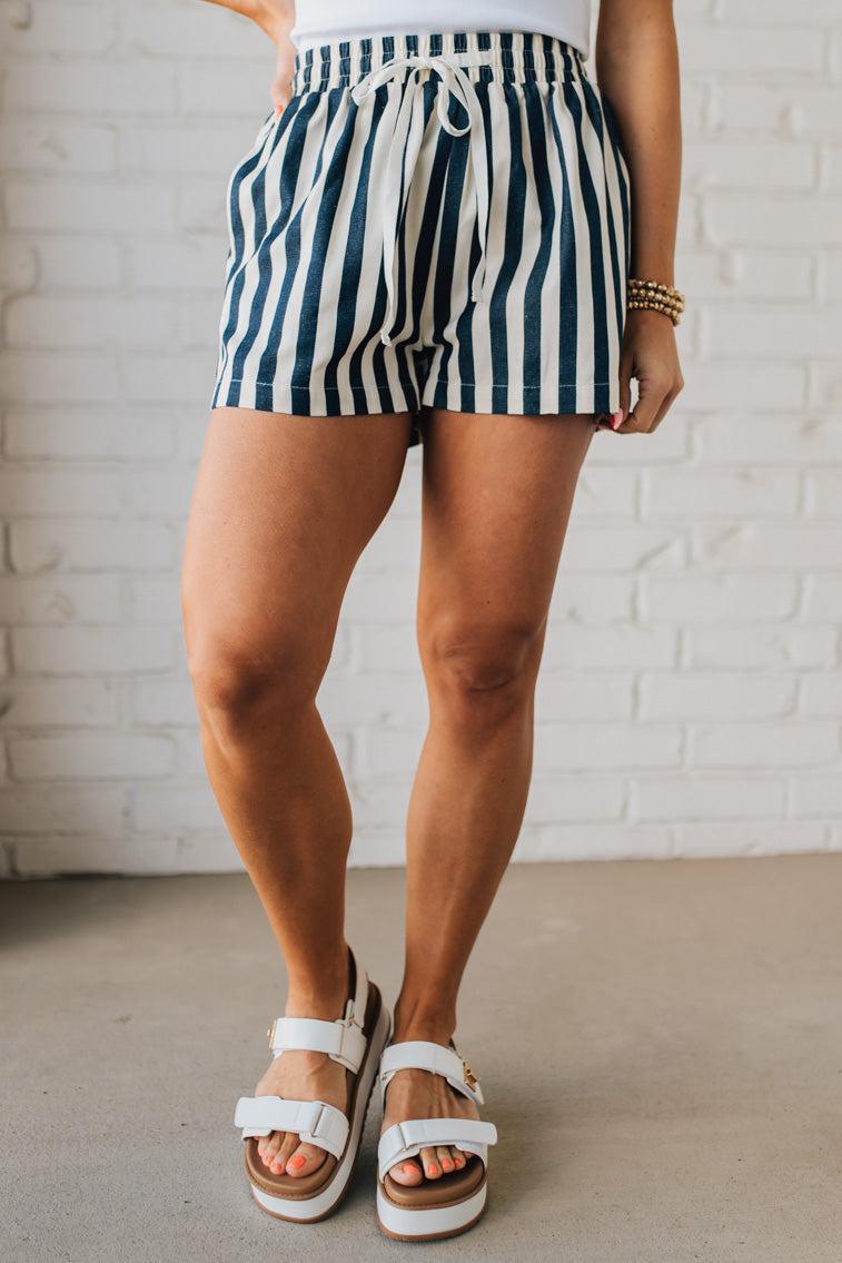Blonde Woman Wearing Stripe Twill Shorts with Elastic Waist and Drawstring.
