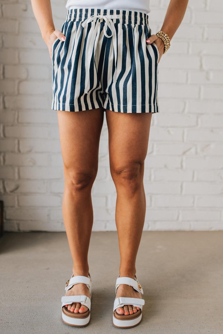 Blonde Woman Wearing Stripe Twill Shorts with Elastic Waist and Drawstring.