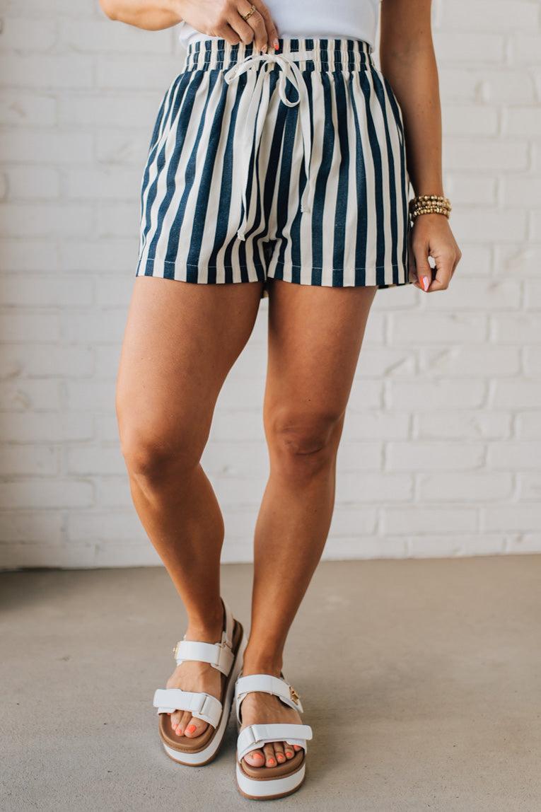 Blonde Woman Wearing Stripe Twill Shorts with Elastic Waist and Drawstring.