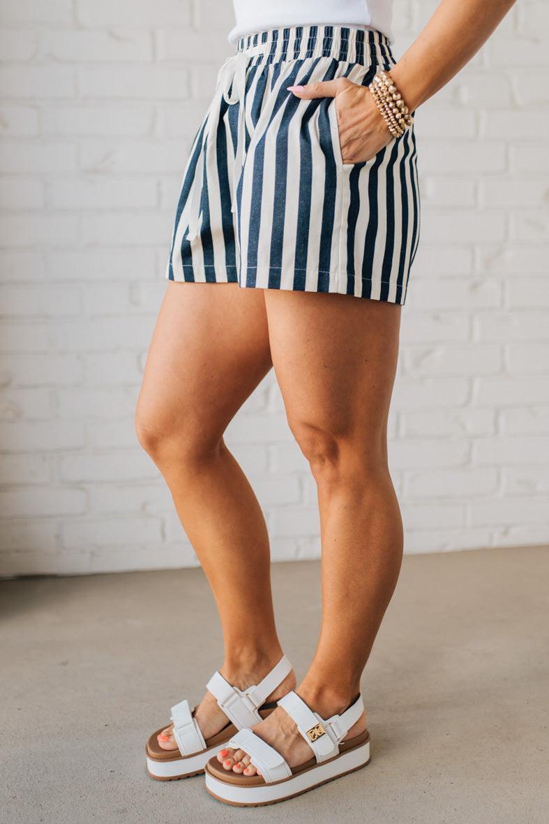 Blonde Woman Wearing Stripe Twill Shorts with Elastic Waist and Drawstring.