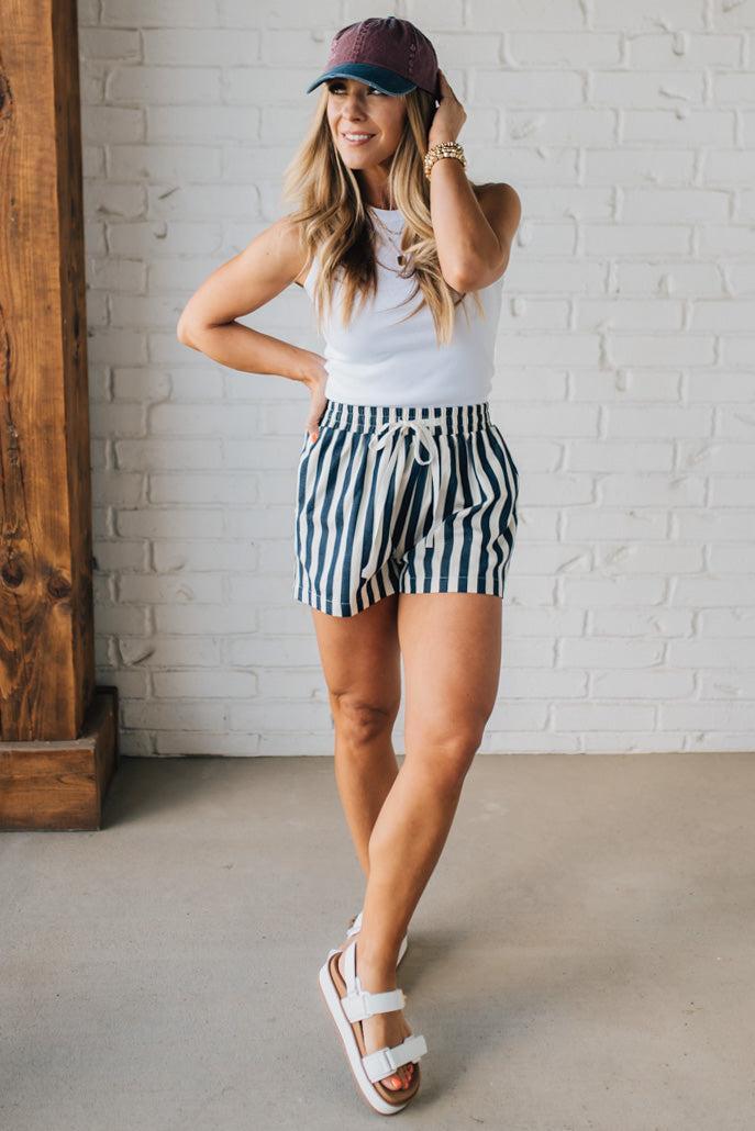 Blonde Woman Wearing Stripe Twill Shorts with Elastic Waist and Drawstring.