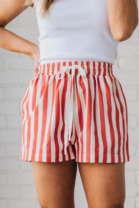 Blonde Woman Wearing Stripe Twill Shorts with Elastic Waist and Drawstring.