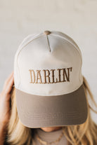 Blonde woman wearing a Darlin' Embroidered Two-tone Canvas Cotton Cap