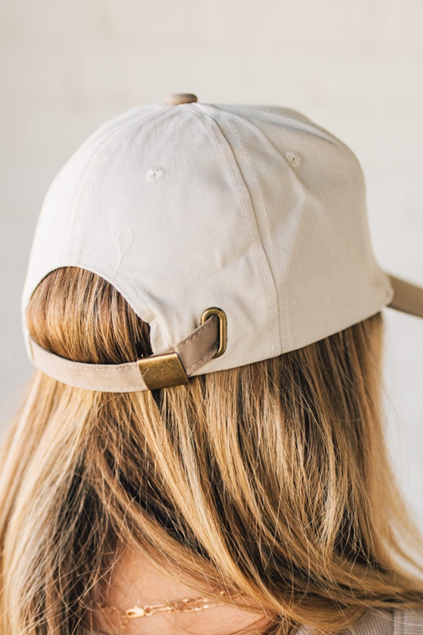 Blonde woman wearing a Darlin' Embroidered Two-tone Canvas Cotton Cap
