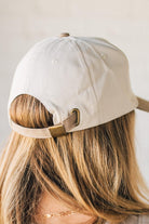 Blonde woman wearing a Darlin' Embroidered Two-tone Canvas Cotton Cap