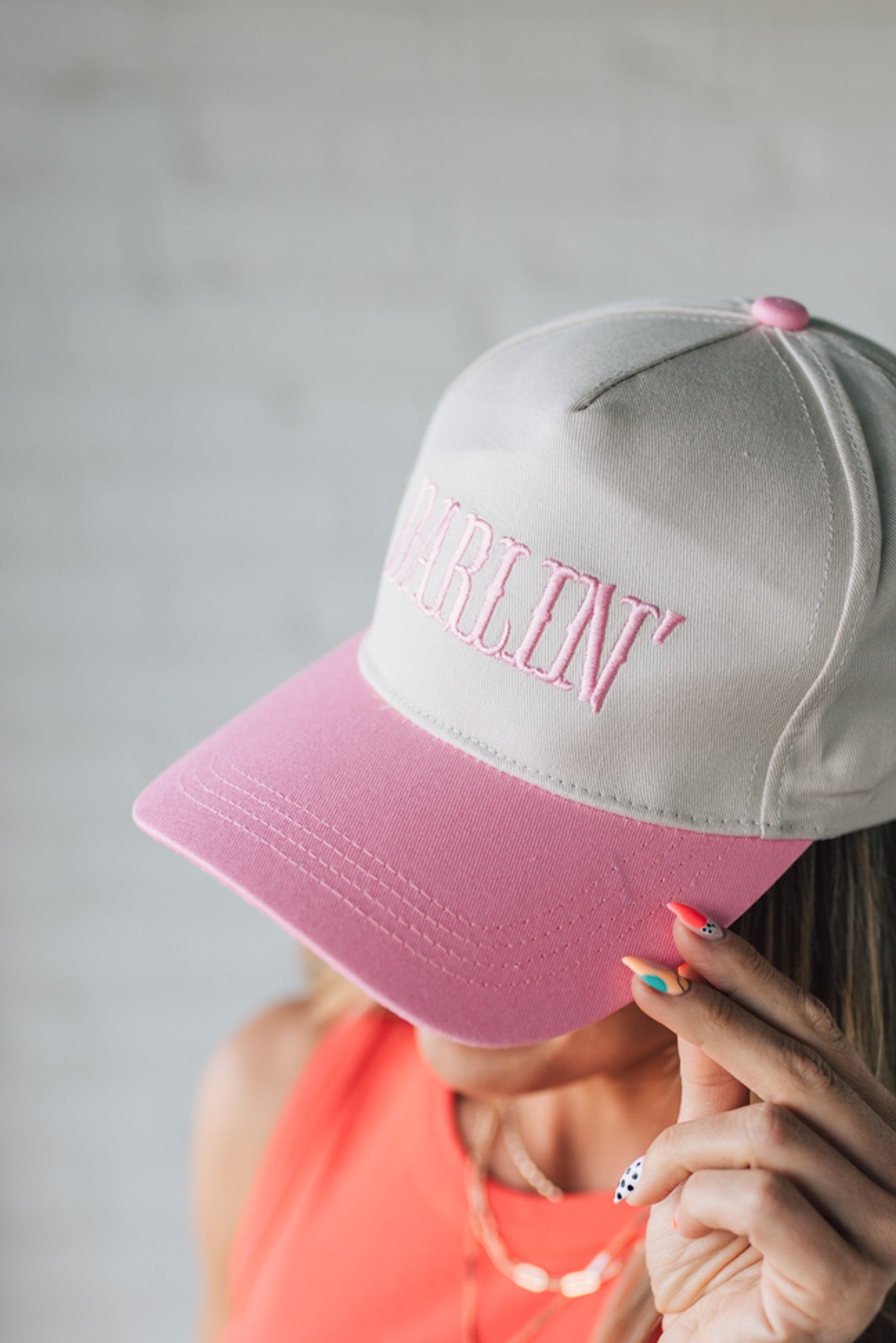 Blonde woman wearing a Darlin' Embroidered Two-tone Canvas Cotton Cap