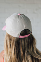 Blonde woman wearing a Darlin' Embroidered Two-tone Canvas Cotton Cap