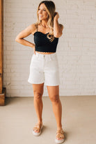 Blonde Woman Wearing a Seamless Lace Bralette With Bra Pads with Ribbed Texture and Eyelet Lace.