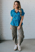 Triple Tied Front Bubble Sleeve Peplum Denim Shirt on Blond Woman