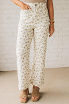 Blonde woman wearing Ditsy Floral Printed Front Pocket Stretch Wide Leg Jeans.
