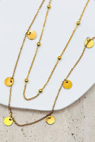 18K Gold Dipped Stainless Steel Layered Chain Necklace with small disc charms.