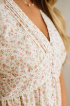 Close-up of a floral dress with a blurred background