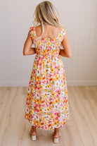 DARLING FLORAL MAXI DRESS FEATURES:
- COTTON FLORAL PRINT FABRICATION
- FLORAL EMBROIDERY MOTIF AT FRONT BUST
- RUFFLED SHOULDERS
- HIDDEN SIDE ZIPPER
- SIDE POCKETS
- SMOCKED BACK BODICE
- LACE INSET FLOUNCE
- FULL LINING