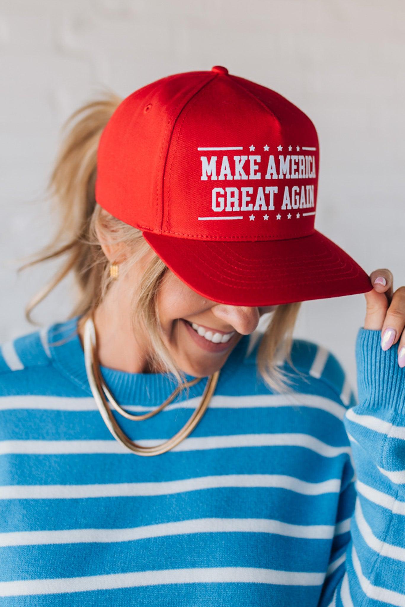 Red hat on a blonde woman with Americana theme.