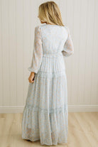 Blonde Woman Wearing a Button Front, Light Blue Floral Lace Paneled Maxi Dress.