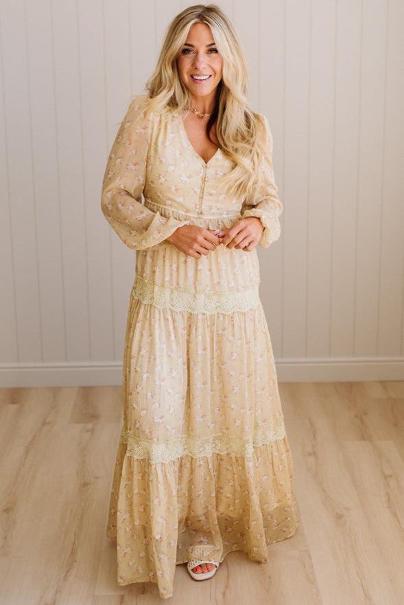 Blonde Woman Wearing a Button Front, Light Yellow Floral Lace Paneled Maxi Dress.