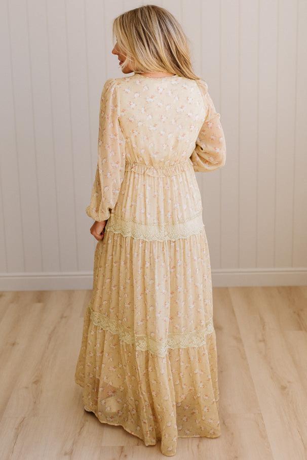 Blonde Woman Wearing a Button Front, Light Yellow Floral Lace Paneled Maxi Dress.