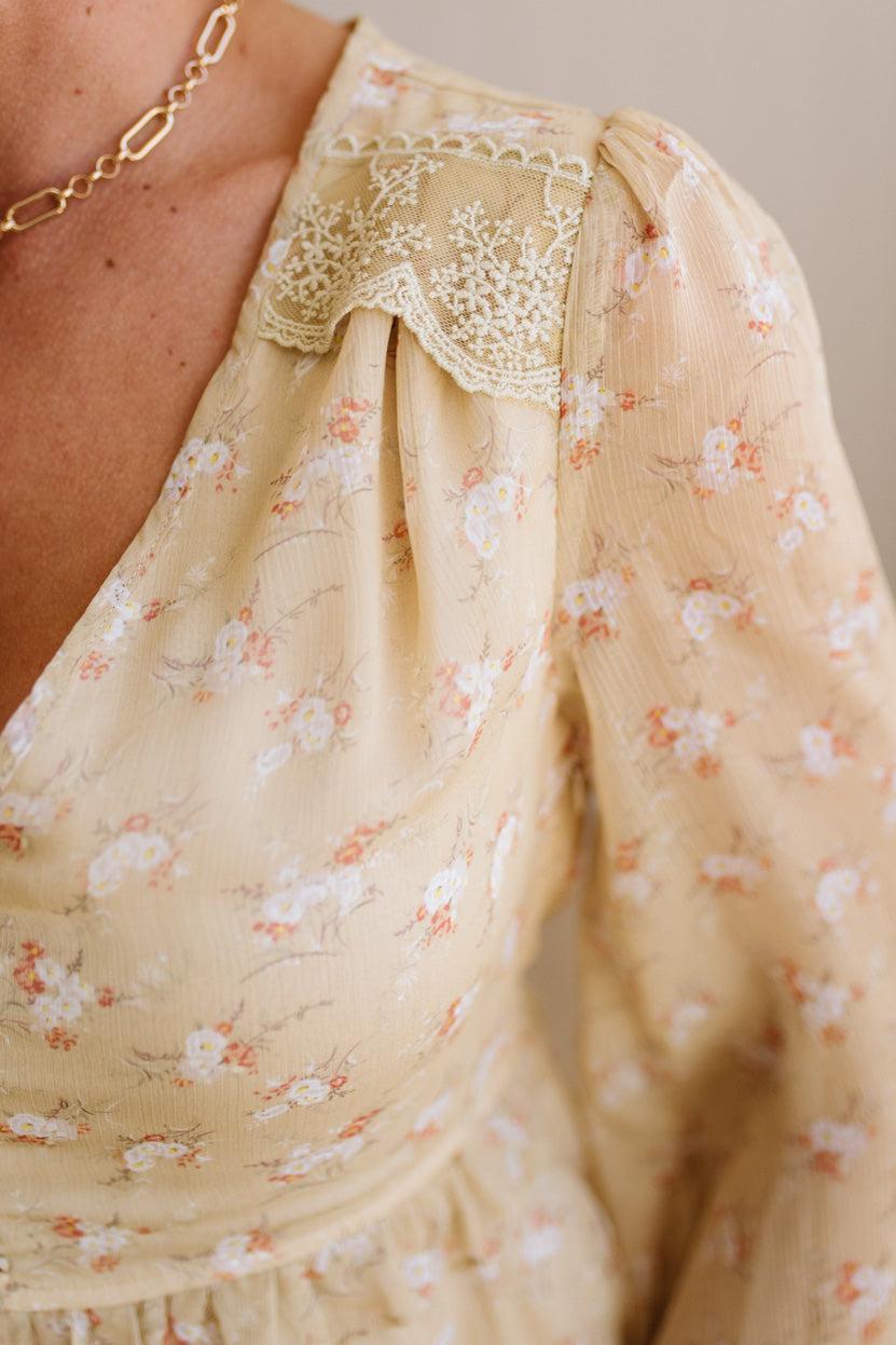 Blonde Woman Wearing a Button Front, Light Yellow Floral Lace Paneled Maxi Dress.