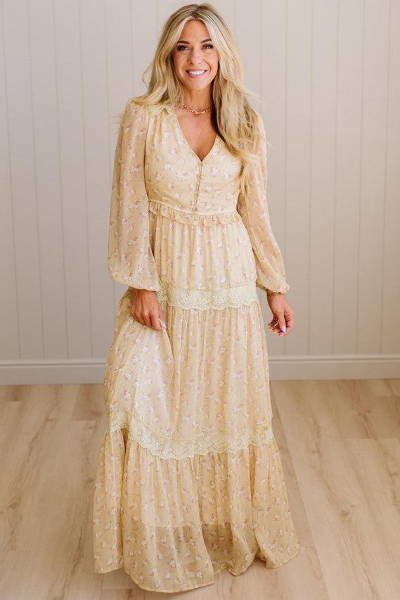 Blonde Woman Wearing a Button Front, Light Yellow Floral Lace Paneled Maxi Dress.