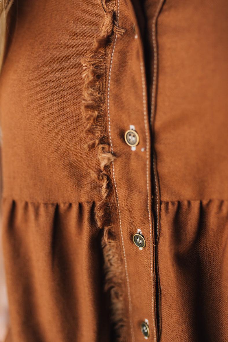 Linen Button Up Shirt Dress with a Ruffled Gathered Sleeve and Frayed Hem Details
