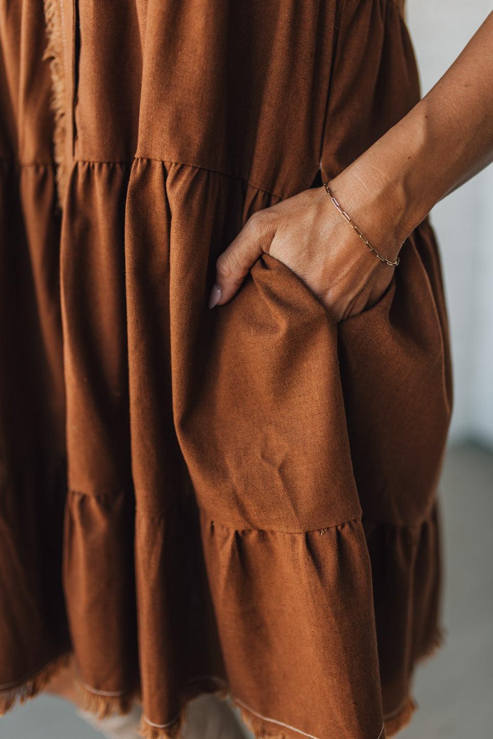 Linen Button Up Shirt Dress with a Ruffled Gathered Sleeve and Frayed Hem Details
