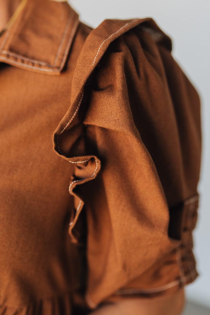 Linen Button Up Shirt Dress with a Ruffled Gathered Sleeve and Frayed Hem Details
