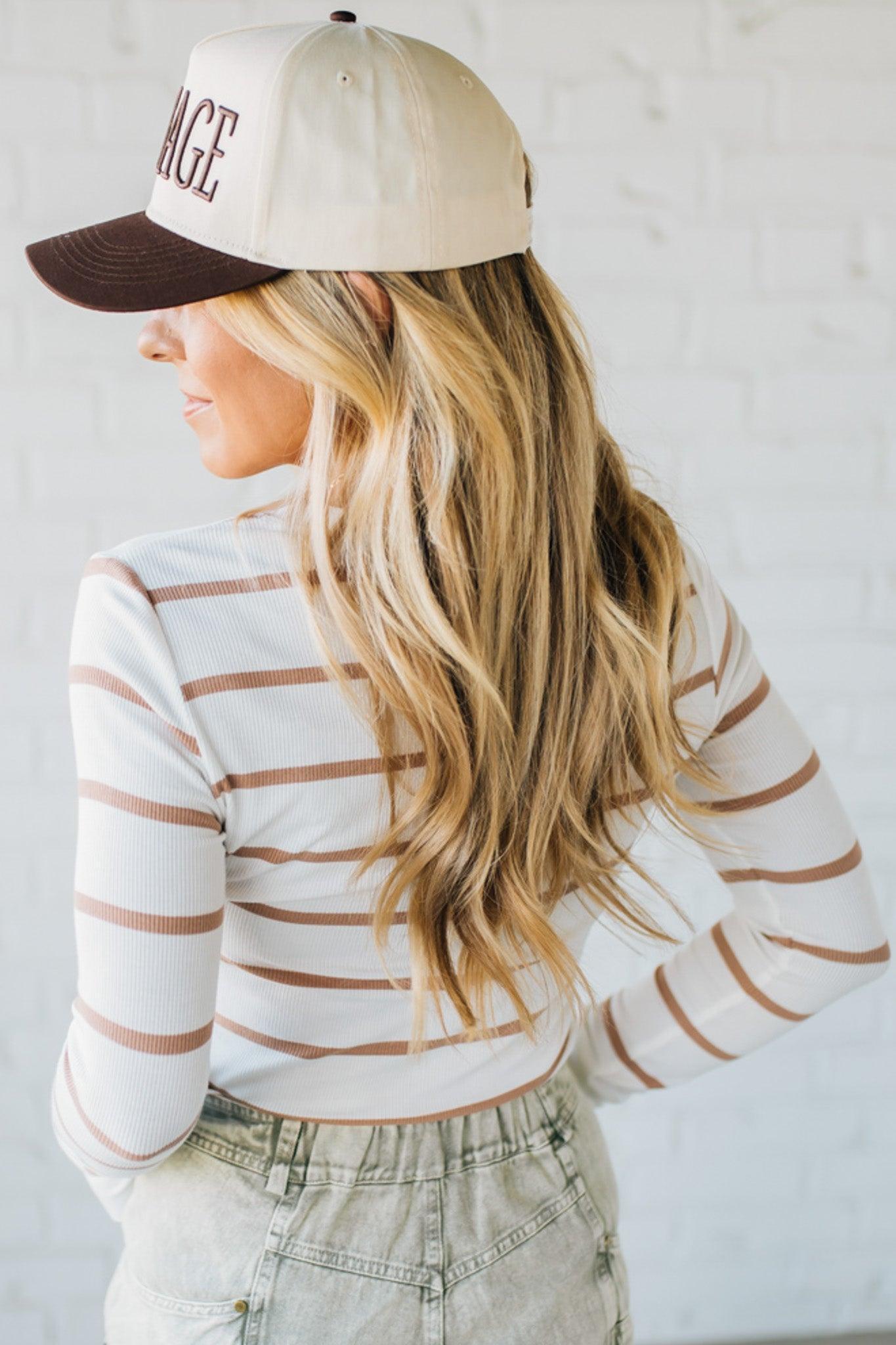 Blonde woman wearing a Classic Ribbed Striped Henley Long sleeve Top.