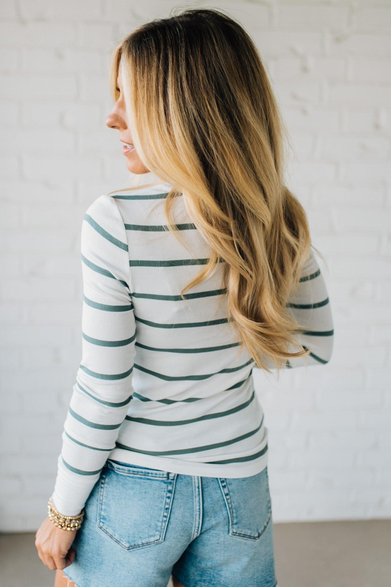 Blonde woman wearing a Classic Ribbed Striped Henley Long sleeve Top.