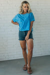 women wearing a ocean blue mineral wash short sleeve boxy fit tee shirt