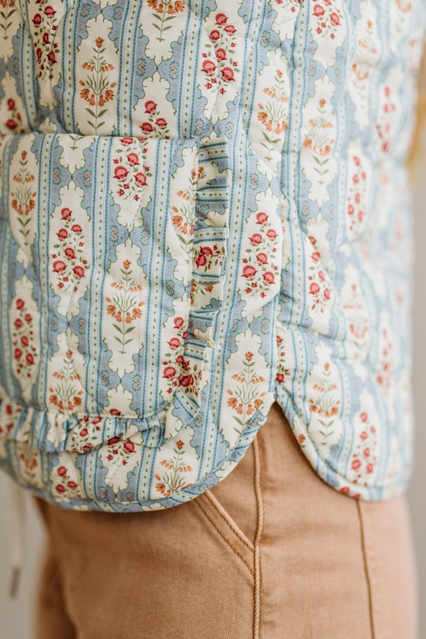 Close-up of a floral patterned fabric with a neutral background