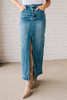 High Waist blue denim maxi skirt with center slit.