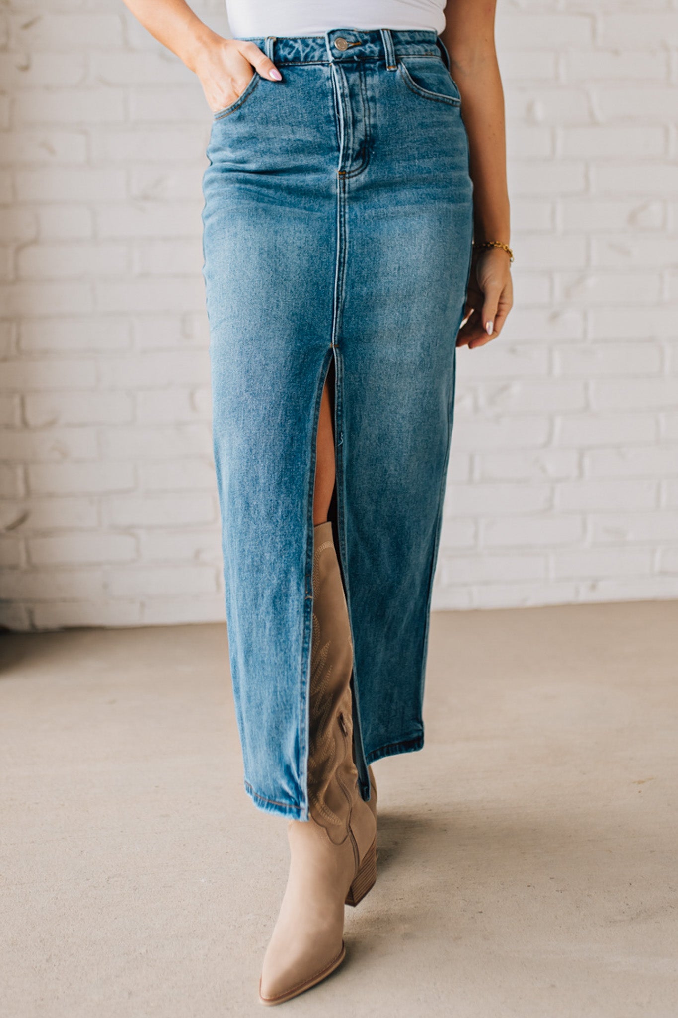 High Waist blue denim maxi skirt with center slit.