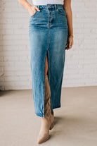 High Waist blue denim maxi skirt with center slit.